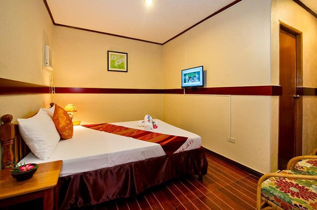 Floral Villarosa Puerto Princesa Chambre photo